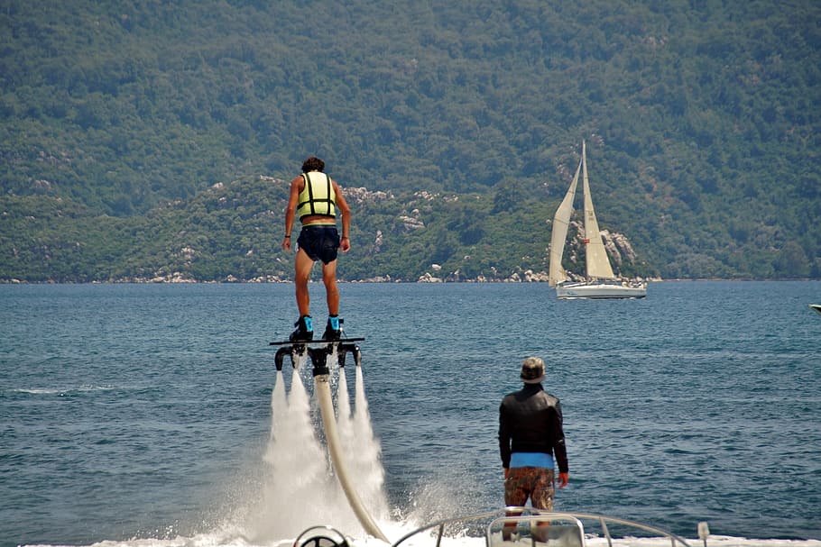 flyboarding, water sport, extreme, jets, fun, sea, real people, HD wallpaper