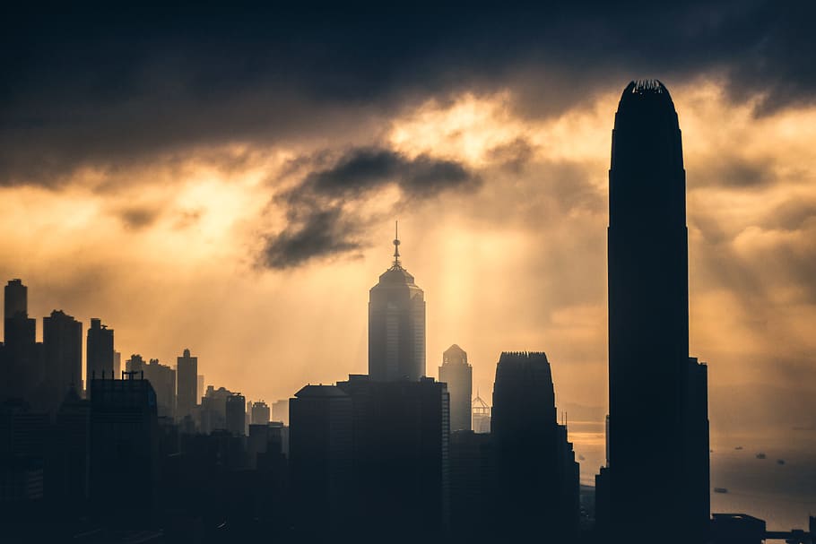 silhouette photography of high-rise buildings during golden hour, photo of buildings during sunset HD wallpaper