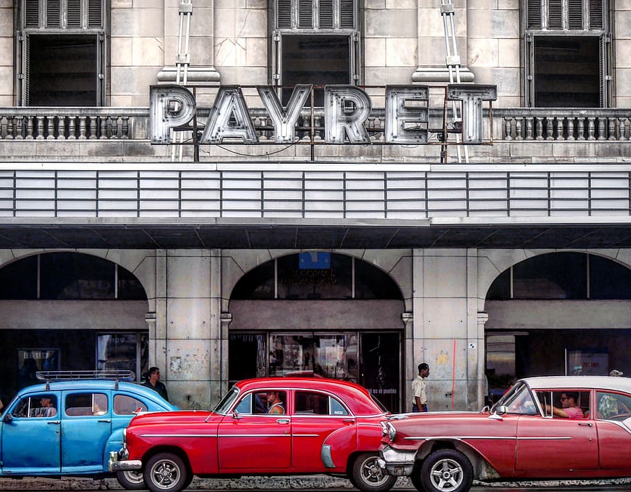 Havana, Cuba, red and blue cars near building, payret, classic