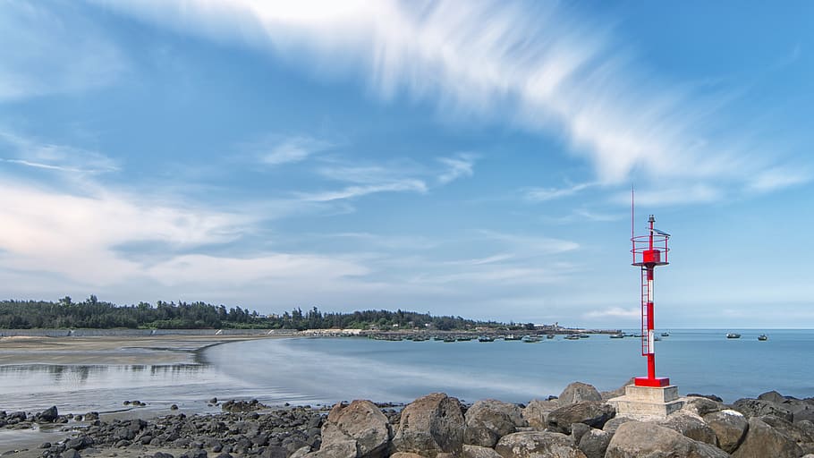 lighthouse, beach, blue sky, coast, water, cloud - sky, guidance HD wallpaper