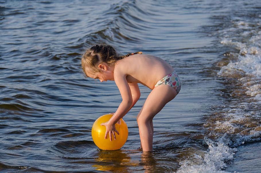 girl standing on seashore holding ball, Kids, Wave, beach, sandy beach
