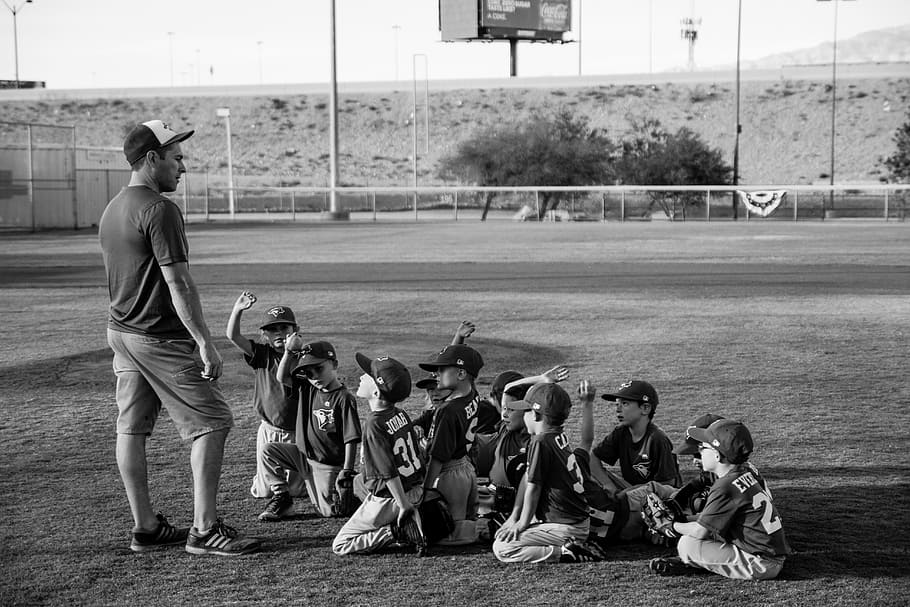 grayscale photo of boys football team in front of coach, people at baseball field, HD wallpaper