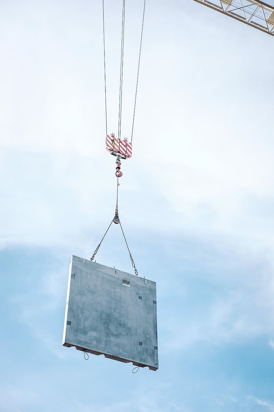Building a City - Condos and Cranes, hanging gray board, concrete