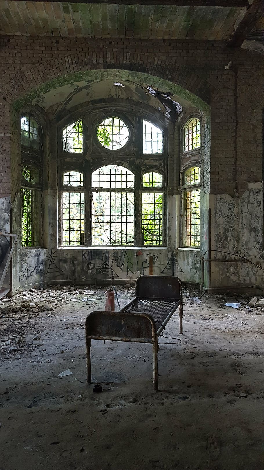 brown steel bed inside room, urbex, beelitz heilstätten, abandoned hospital