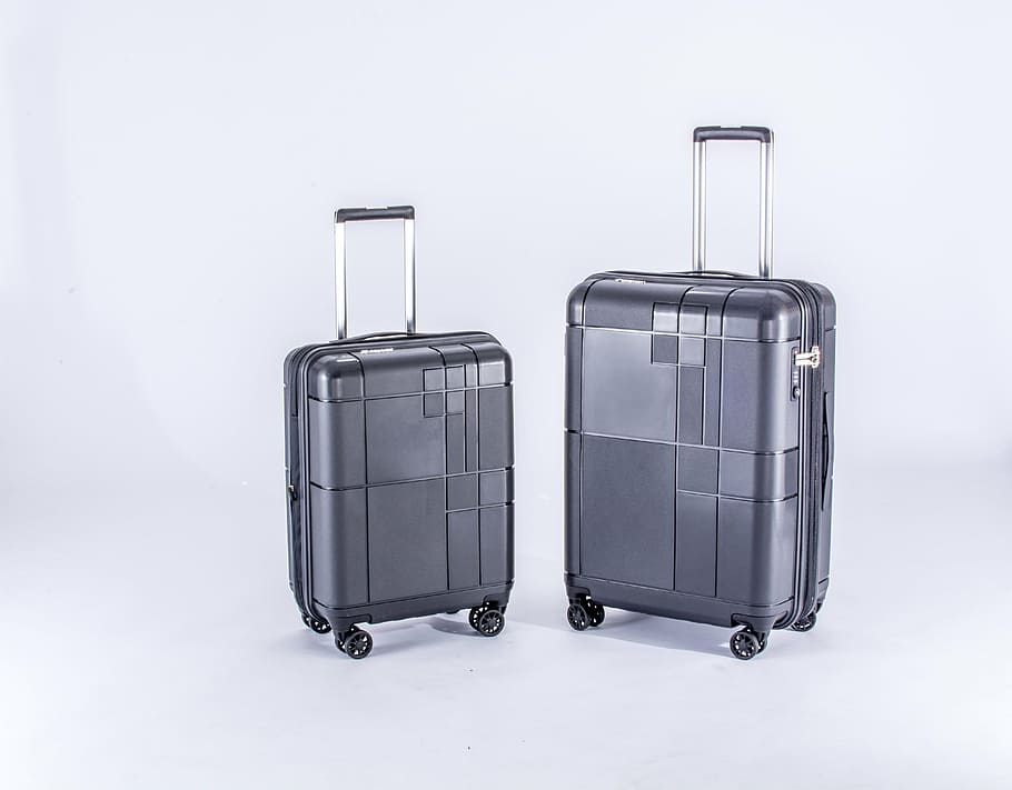 two grey luggage trolley bags on white surface, luggages, case HD wallpaper