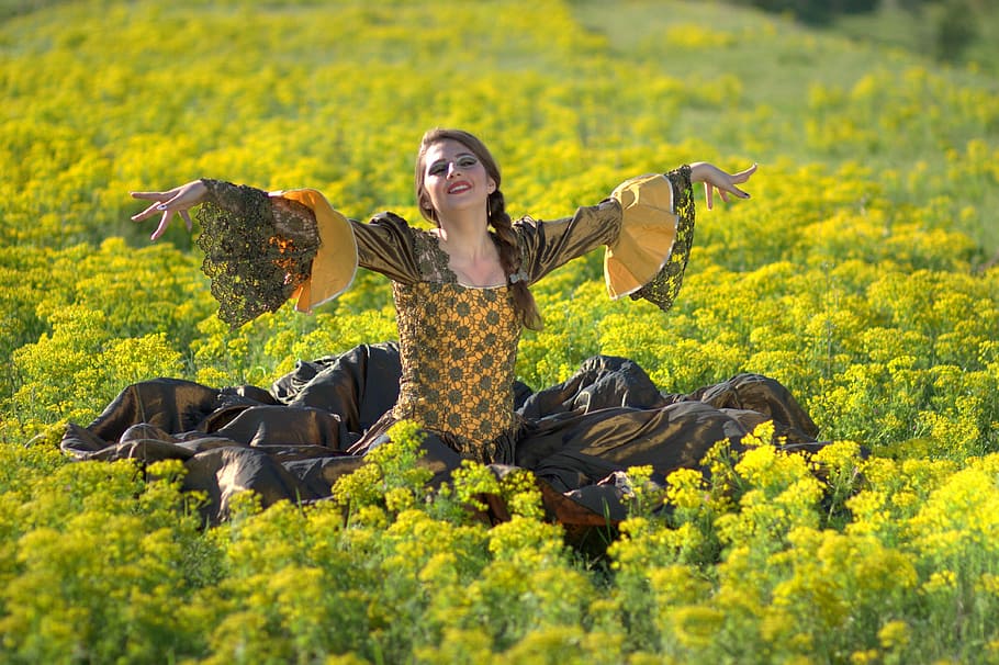 woman standing on green grass field, girl, flowers, joy, princess