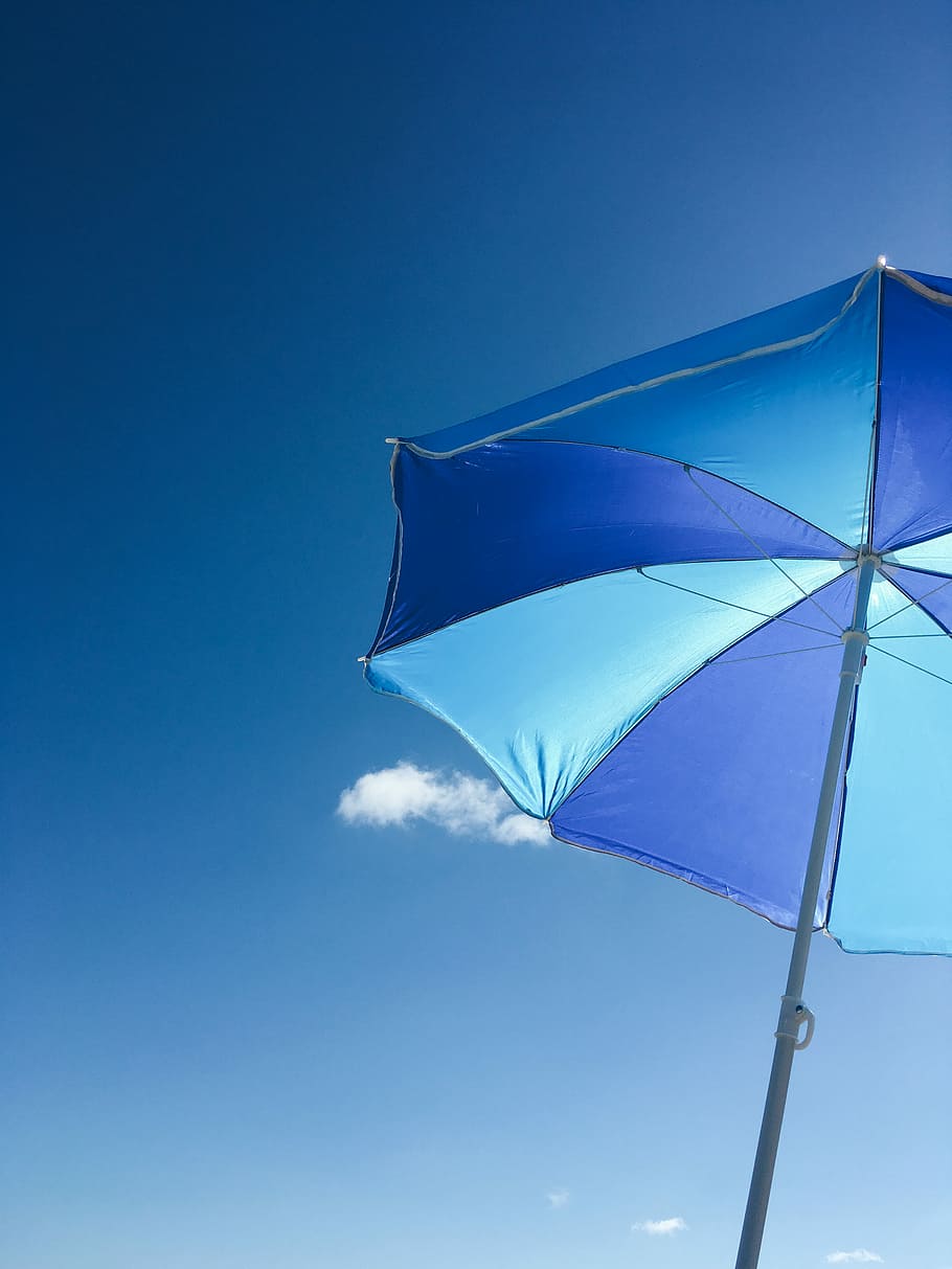 worms-eye-view of blue patio umbrella, low angle photography of blue umbrella during daytime HD wallpaper
