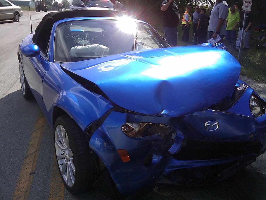 wrecked blue Mazda coupe on highway during daytime, car, accident HD wallpaper
