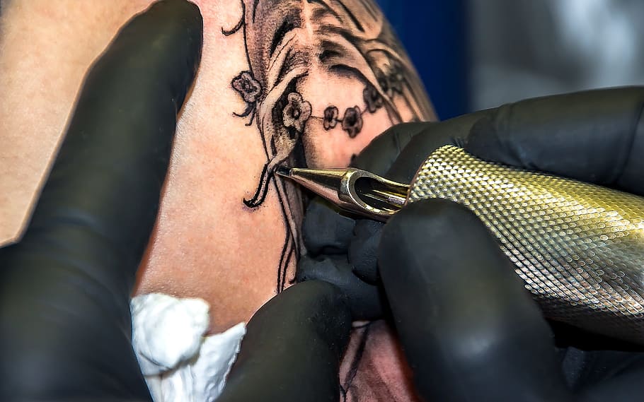 HD wallpaper person putting tattoo tattoo artist tatoo drawing lotus  flower  Wallpaper Flare