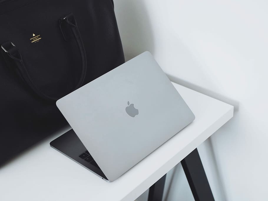 opened MacBook on table, silver MacBook on white table, laptop HD wallpaper