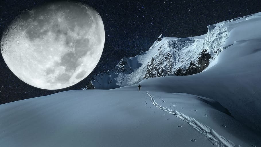 person standing on a land filled with snow with visible moon on background HD wallpaper