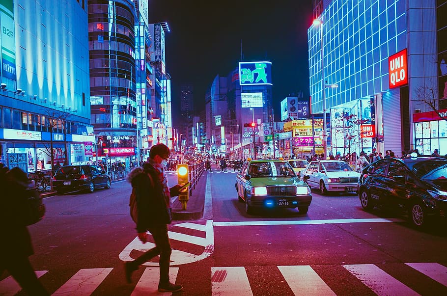 person walking on lane in busy streets, japan, osaka, night, asia