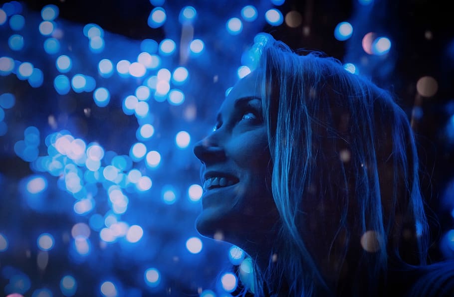 woman looking at the sky, close-up photo of smiling woman while looking towards dim lights above her, HD wallpaper