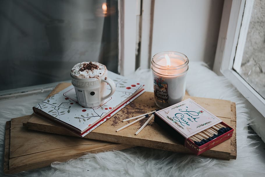 flat lane photograph of votive candle; match box; cup of beverage HD wallpaper