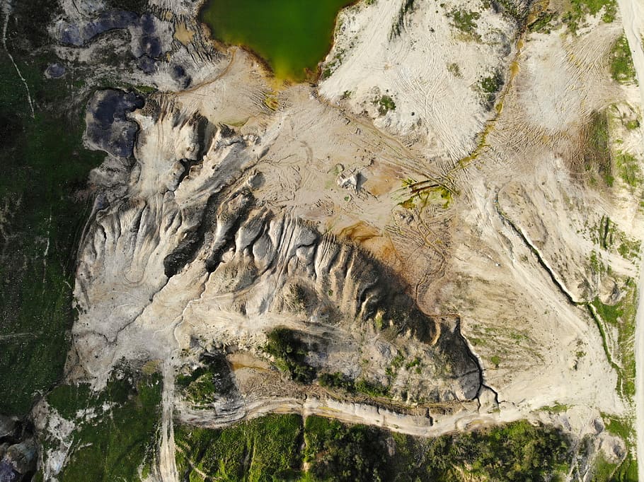 area view of mountain near body of water, aerial view of mountain HD wallpaper