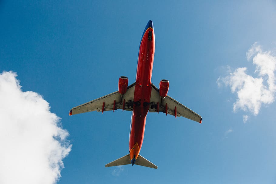 Going places!, low angle photography of red and white airplane HD wallpaper