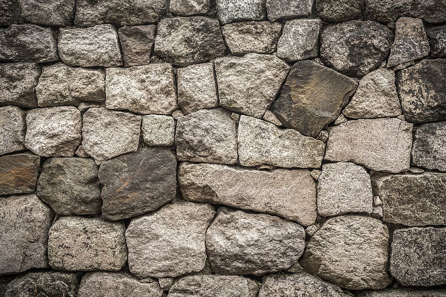 closeup photo of grey concrete bricks, wall, damme, stone wall